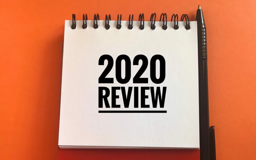 2020 review note on orange backdrop