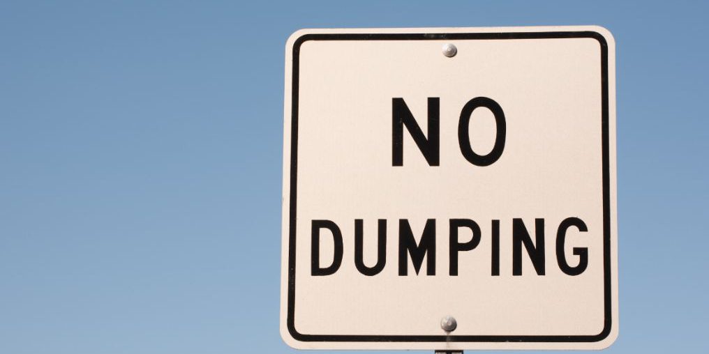 Closeup of no dumping sign