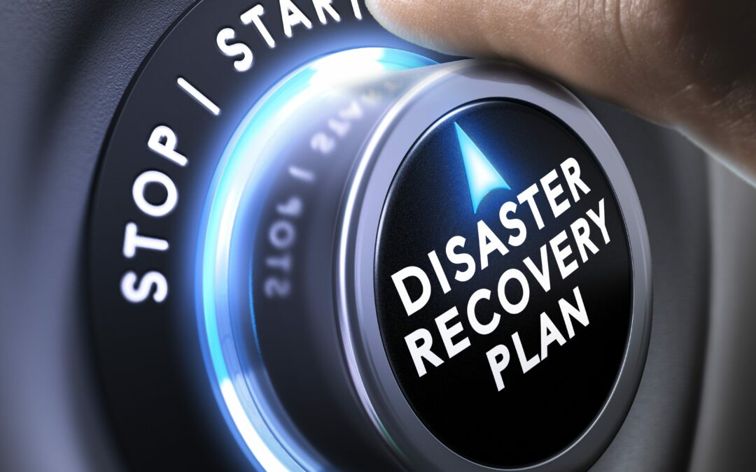 closeup of man touching disaster recovery plan button